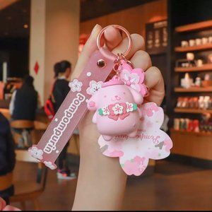 hello kitty keychain pompompurin